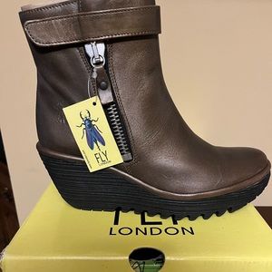 Fly London NWT shoes.  Stylish, dress up or casual.